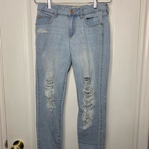 Light wash distress denim jeans